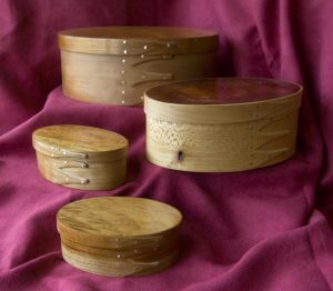 oval wooden urns